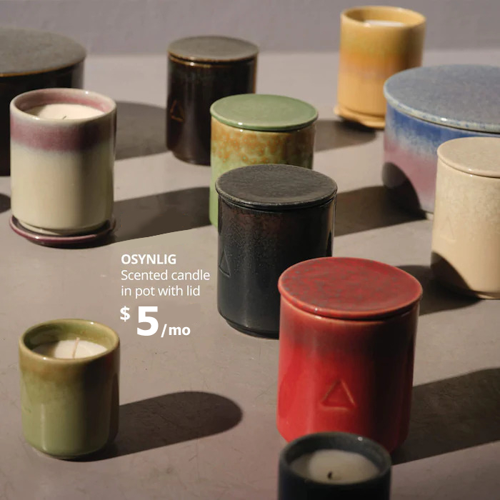 Several candles in colorful jars- New OSYNLIG Scented candle in pot with lid, $9.99.
